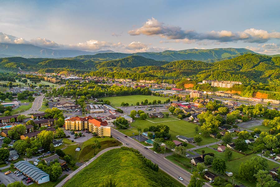 Tennessee - Aerial View Small City In The Summer Between Mountains In Tennessee